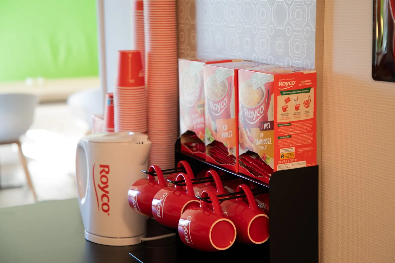 Royco soup corner with cups and red mugs in the coffee corner of Office Capital Hasselt